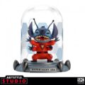 DISNEY - Figurine "Stitch 626" - Lovable blue alien character with big ears and a mischievous expression, holding a flower in one hand and striking a playful pose.